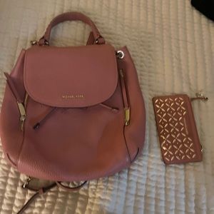 Michael Kors bag and wallet, Quay sunglasses, Nike hats and Adidas jumpsuit